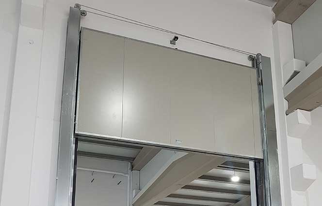 Puerta guillotina telescopica